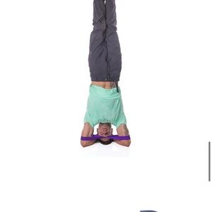 Purple infinity strap stretch for yoga